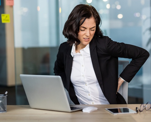 importance of posture for office businesswoman back pain