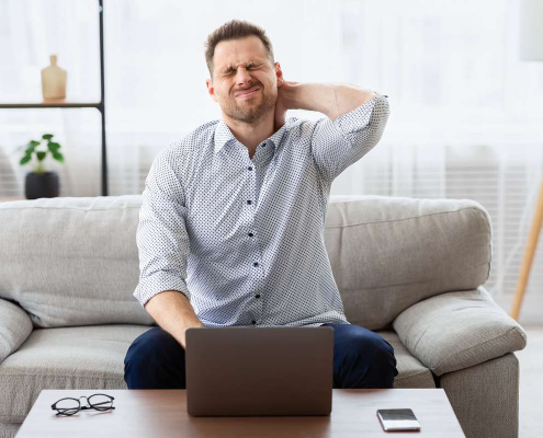 massage ball for man experiencing neck pain