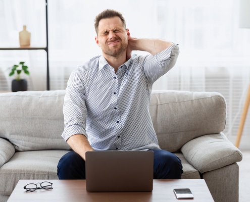 massage ball for man experiencing neck pain