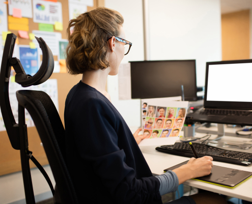 businesswoman working on digitizer at desk 2026 01 09 09 21 03 utc
