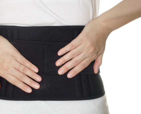 vecteezy woman wearing back support belt isolated on white 10098664