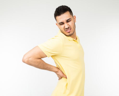 vecteezy brunette man pulled back muscle on a white studio background 70935289