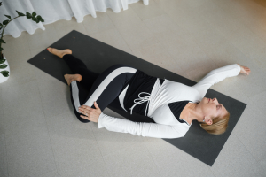 vecteezy woman practices yoga on mat at home in natural light during 78351465