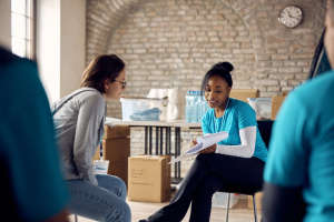 black volunteer coordinator giving instructions to 2026 01 06 10 28 14 utc