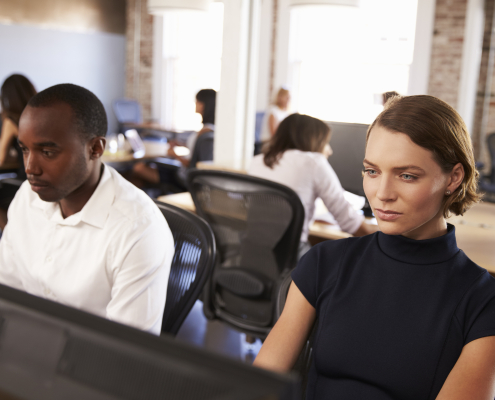 businesspeople working at computers in busy modern 2026 01 05 06 27 48 utc (1)