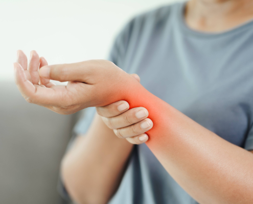 vecteezy closeup of woman sitting on sofa holds her swelling wrist hand 4572743