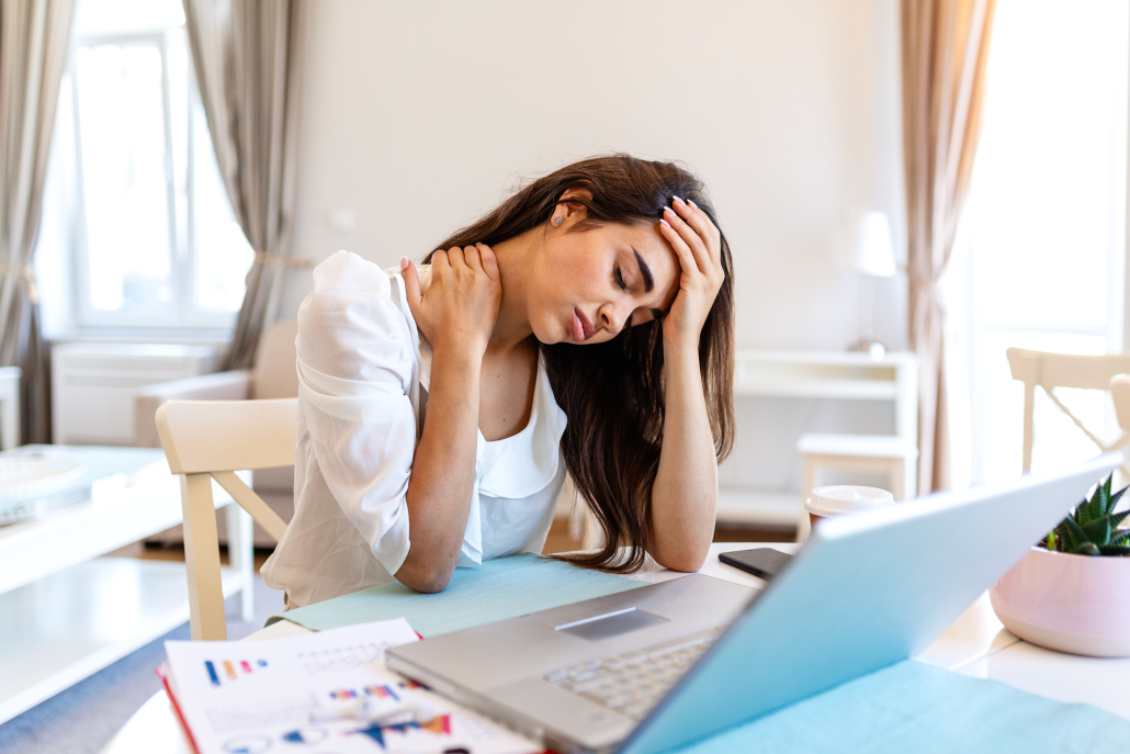 desk worker using what does a neck stretcher do what does a neck stretcher do for tension relief