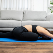 Person stretching gently after finishing how long to stay on acupressure mat routine